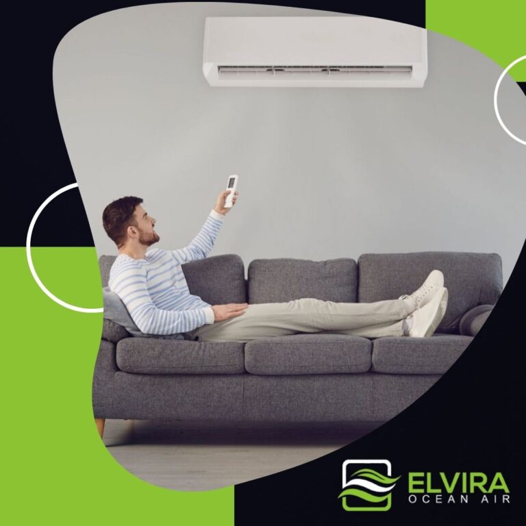 Homeowner on the sofa with a wall-mounted air conditioner
