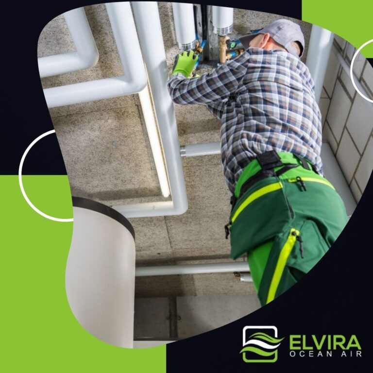 Technician working on a ceiling duct