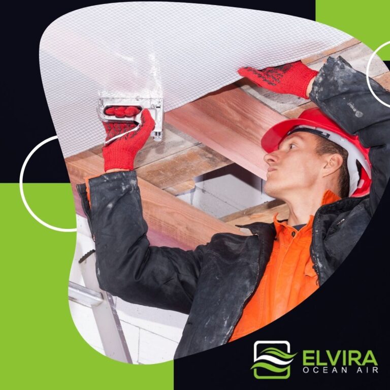 Installer fitting material under the roof framing