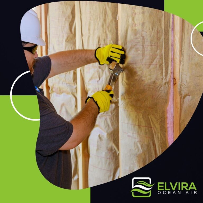Insulation batts being installed