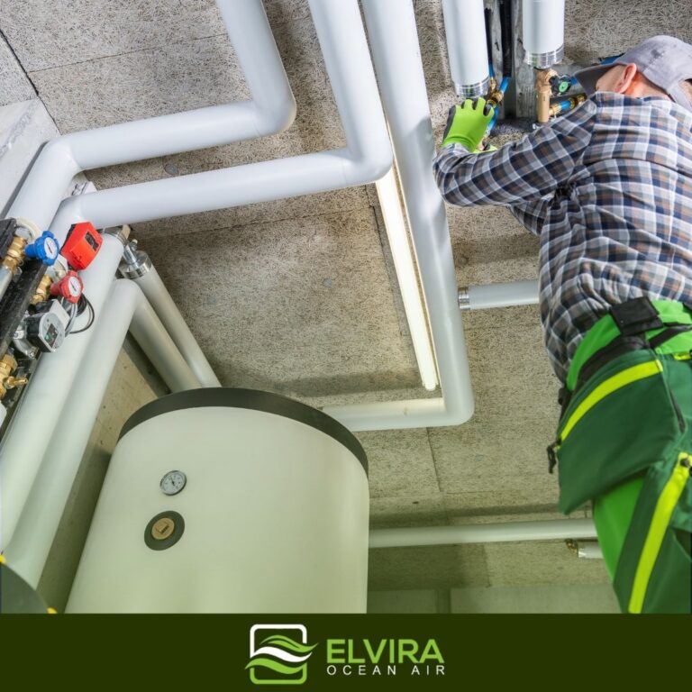 Technician installing a heating system